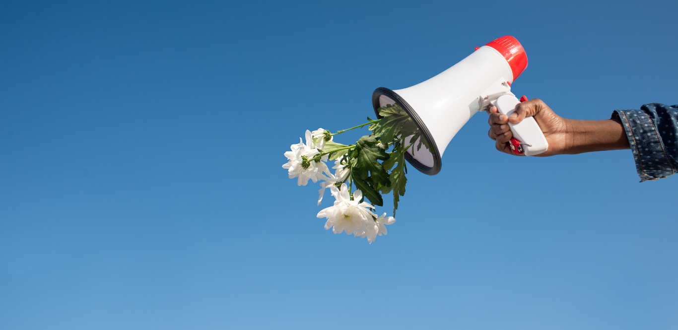 Flowers coming out of a megaphone